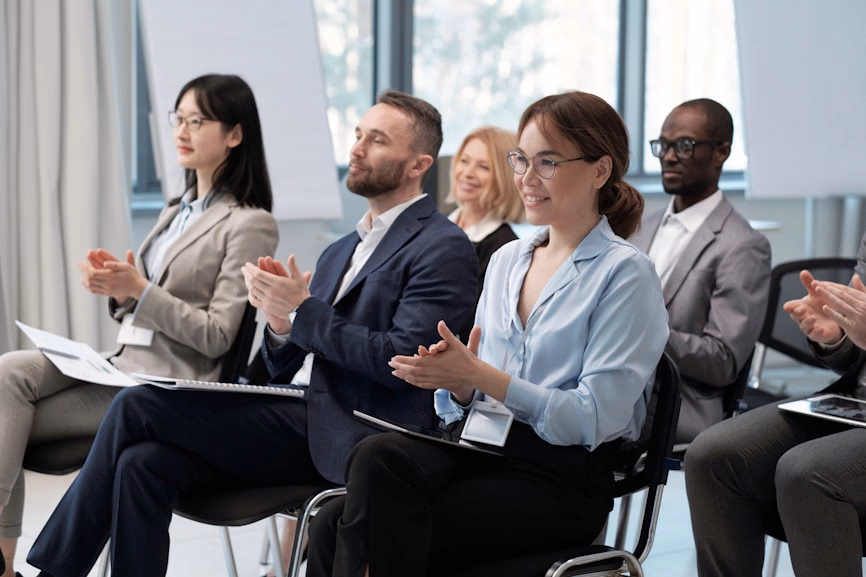 Audience listening to a business presentation